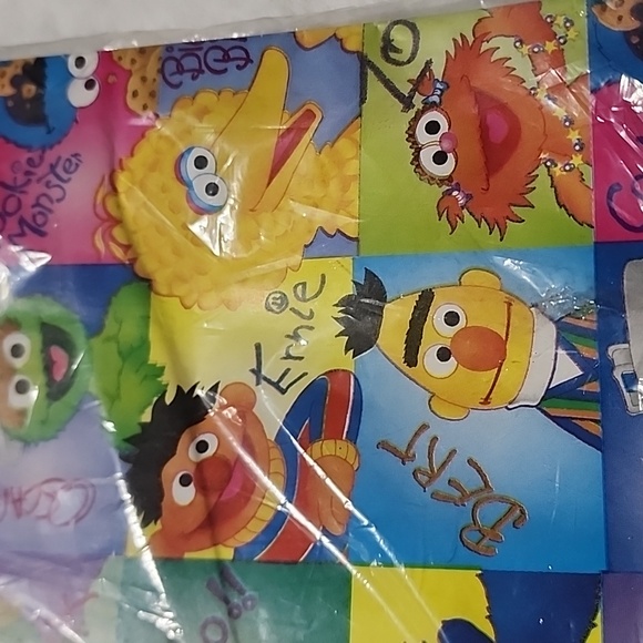 NEW IN PACKAGE.  ALL WRAPPED UP. SESAME STREET  WRAPPING PAPER. - Picture 3 of 4